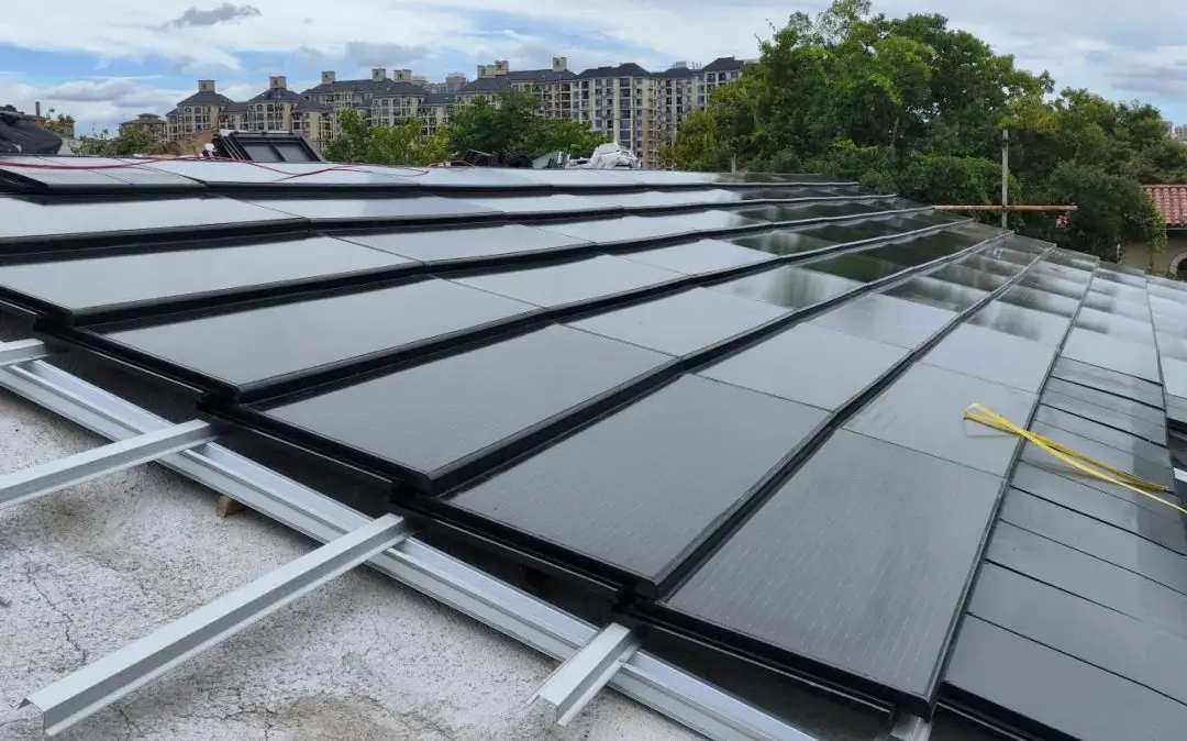 Home solar roof Photos show the installation process of solar roof tiles in a home, illustrating how the tiles are laid.