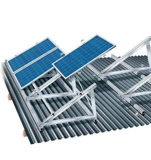Solar panel mounting structure on a corrugated metal roof, showing aluminum tilt triangle brackets and racking rails supporting blue solar modules