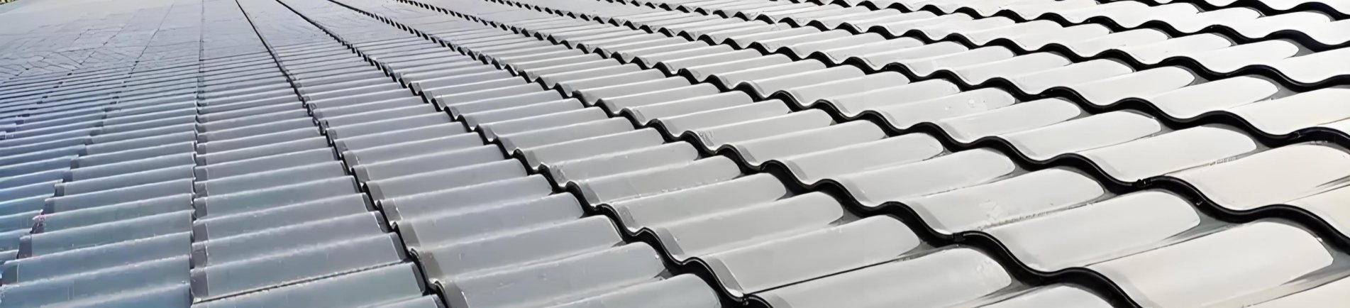 Large-area BIPV curved solar tile roof array for commercial buildings by GreenMore