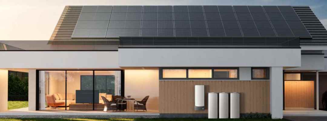 Rendering of GreenMore solar tiles integrated with a solar system on a modern residential roof.